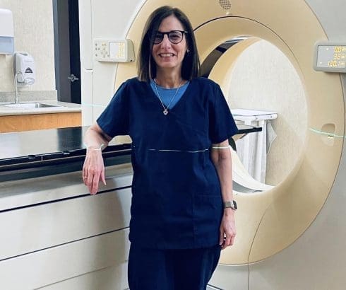 Dr. Barbi Kaplan-Frenkel with radiation machine